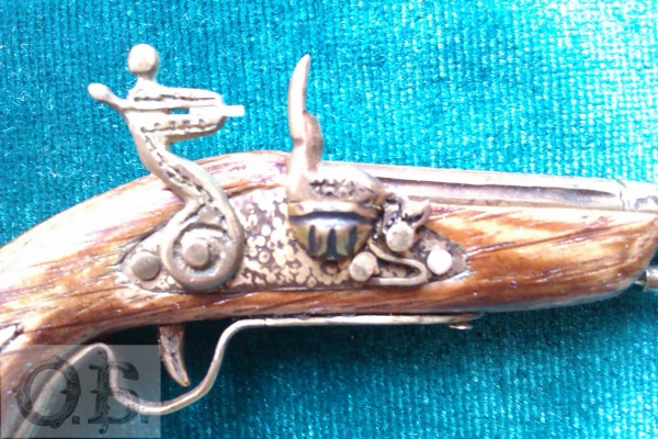 Миниатюрный пистолет с кремневым замком. (Фото 4)